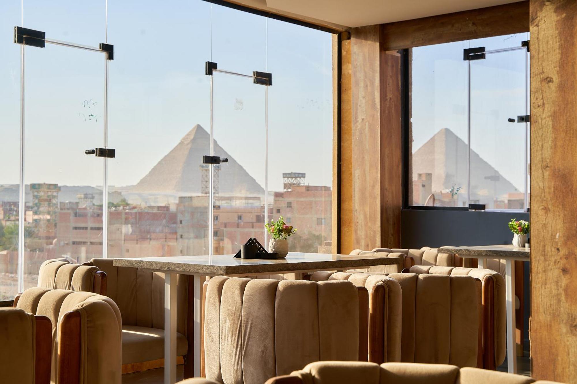 Crown Pyramids View Hotel Giza Bagian luar foto