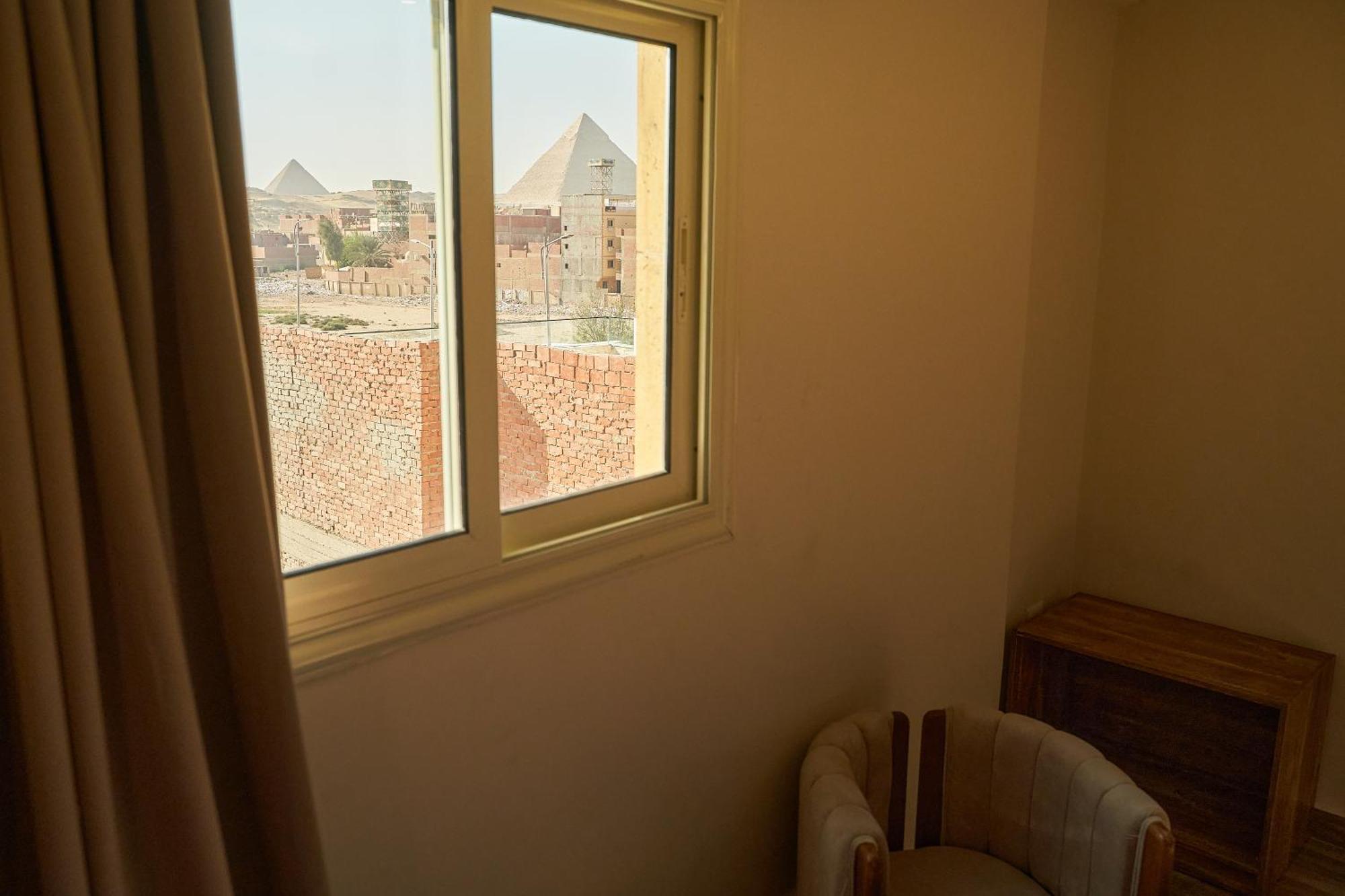 Crown Pyramids View Hotel Giza Bagian luar foto